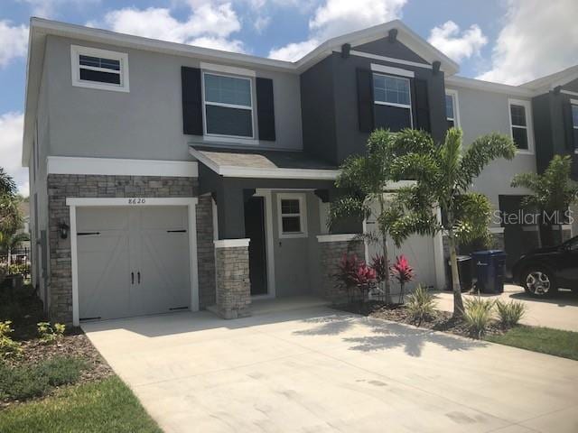 view of front of home with a garage