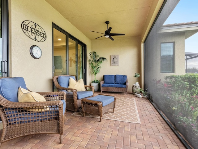 view of patio featuring an outdoor hangout area and ceiling fan