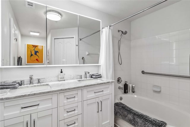 full bath featuring double vanity, a sink, visible vents, and shower / tub combo with curtain