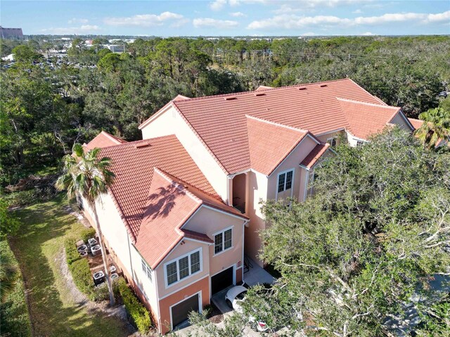 4106 Central Sarasota Pkwy Unit 1013, Sarasota, FL 34238 - view of subject property with a heavily wooded area