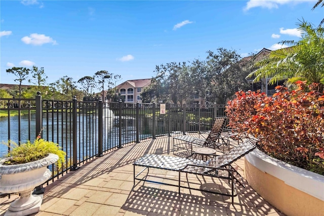 4106 Central Sarasota Pkwy Unit 1013, Sarasota, FL 34238 - view of patio featuring a water view