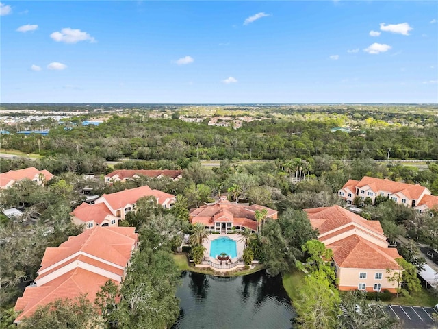 aerial view with a water view and a residential view