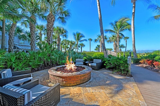 view of patio with a fire pit