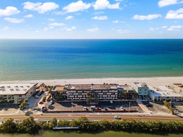 aerial view with a view of the beach and a water view