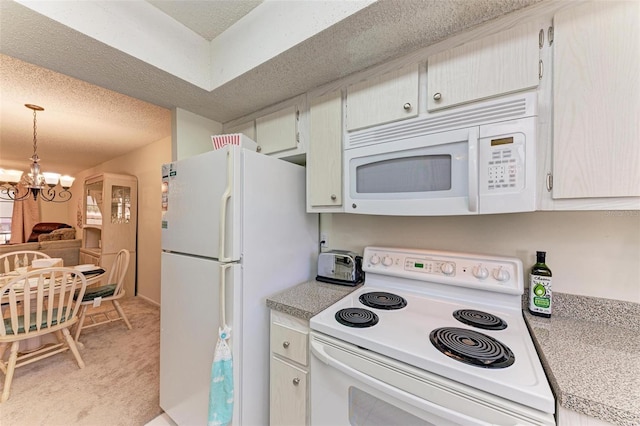 kitchen featuring pendant lighting, white appliances, a textured ceiling, light colored carpet, and a chandelier