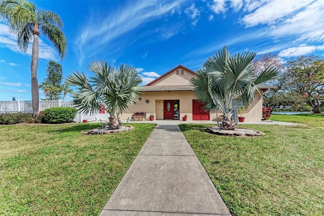 view of front facade with a front yard