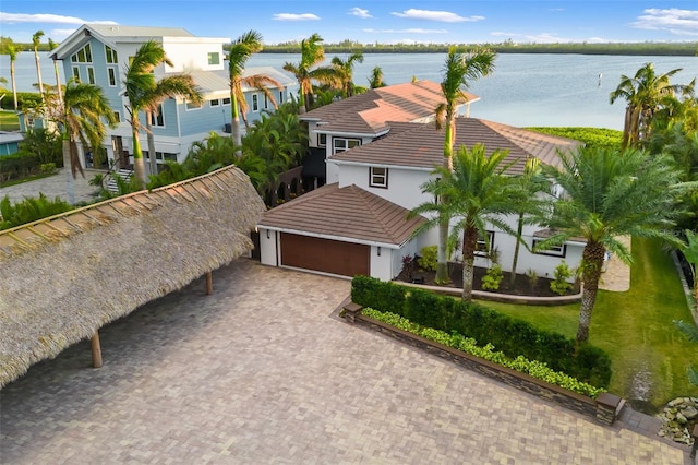 birds eye view of property featuring a water view