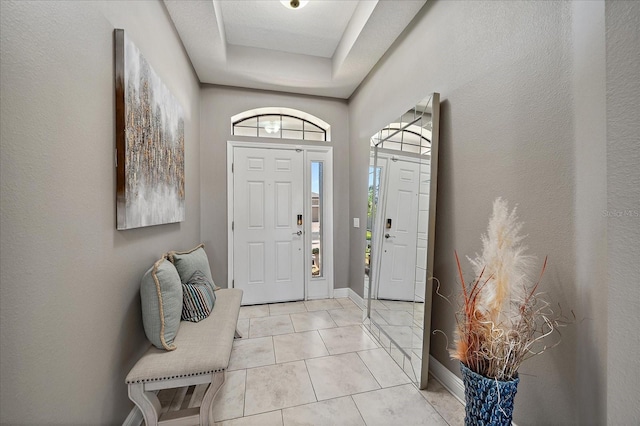 entrance foyer with light tile patterned flooring