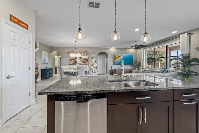 kitchen featuring ceiling fan, sink, stainless steel dishwasher, pendant lighting, and dark brown cabinets