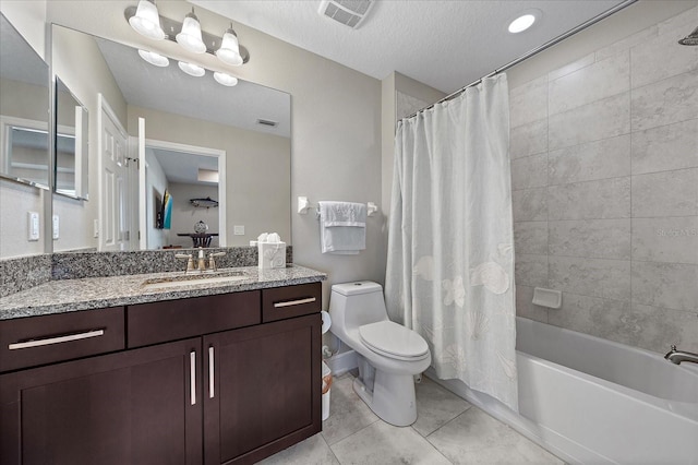 full bathroom featuring shower / bathtub combination with curtain, tile patterned floors, a textured ceiling, toilet, and vanity