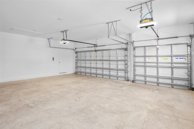 garage featuring a garage door opener