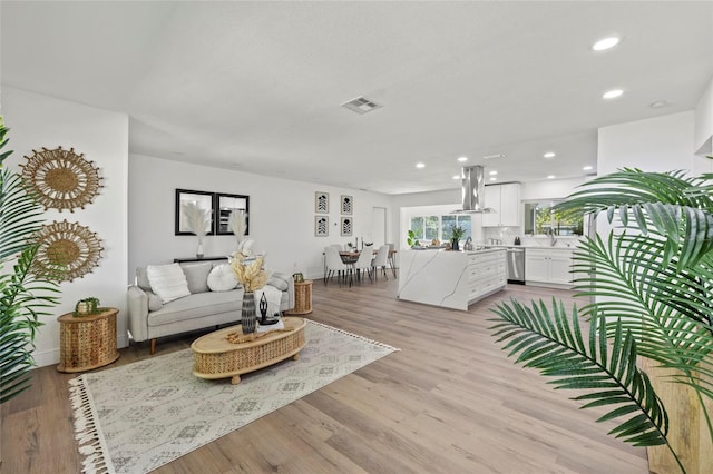 living room featuring light hardwood / wood-style floors