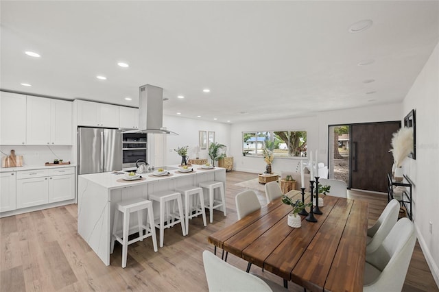 dining room featuring light hardwood / wood-style flooring