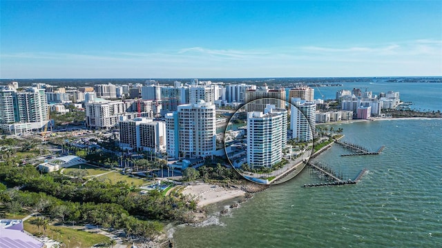 drone / aerial view featuring a water view