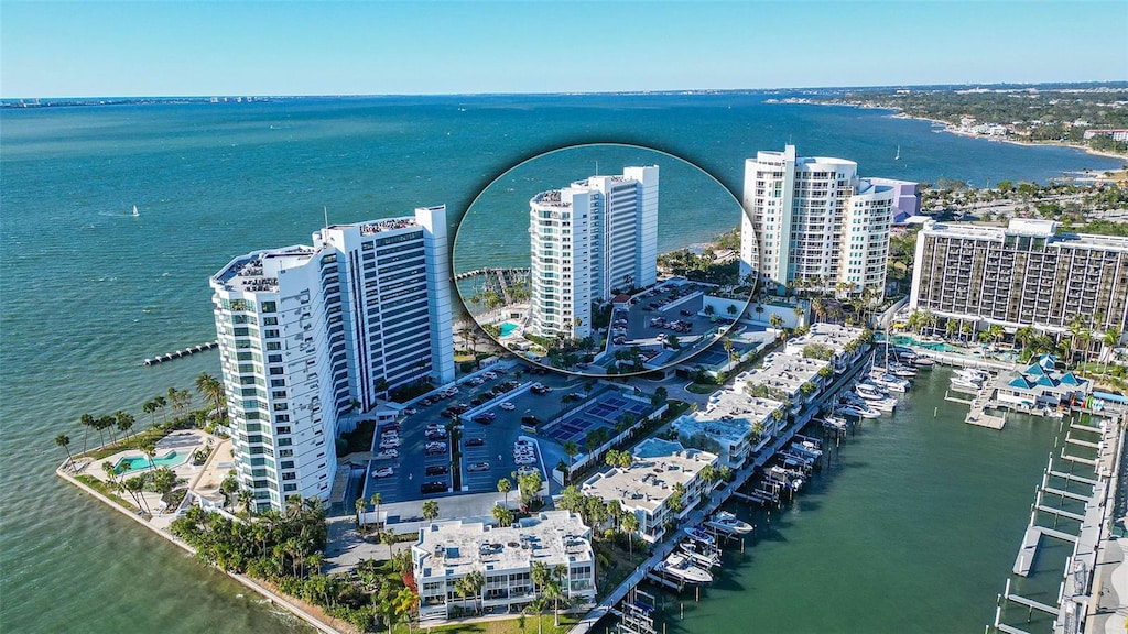 birds eye view of property featuring a water view