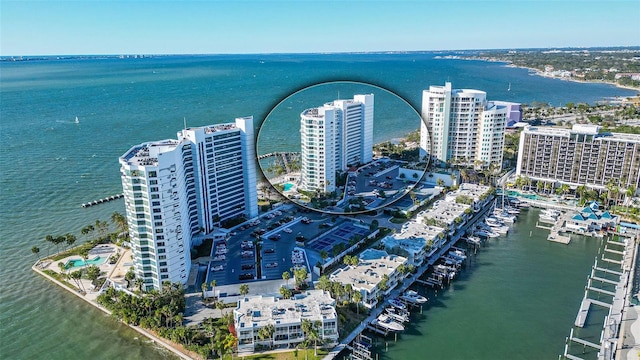 birds eye view of property featuring a water view