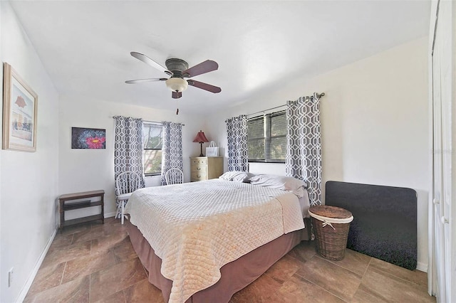 bedroom featuring ceiling fan