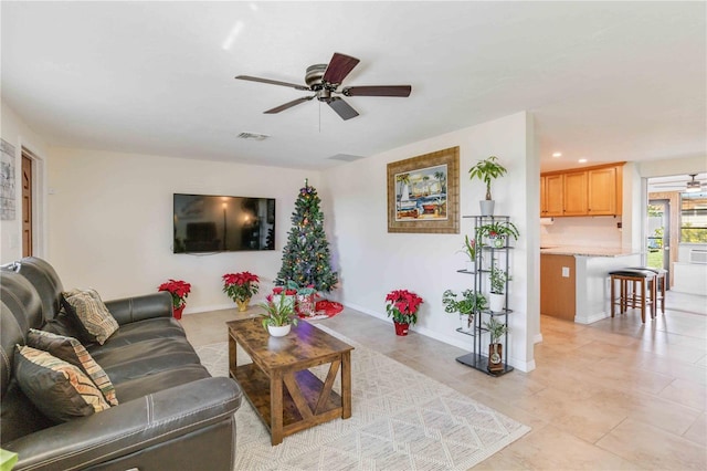 living room with ceiling fan