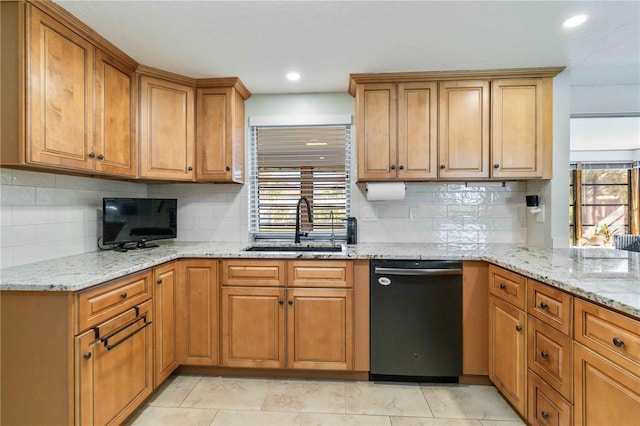 kitchen with dishwasher, sink, light stone counters, decorative backsplash, and light tile patterned floors