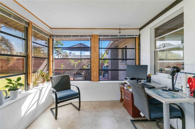 office featuring a wealth of natural light and crown molding