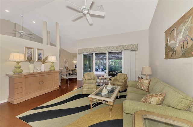 living room with high vaulted ceiling, ceiling fan, and dark wood-type flooring