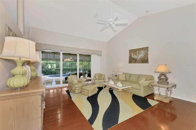 living room with high vaulted ceiling, ceiling fan, and dark wood-type flooring