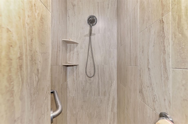 details with a tile shower