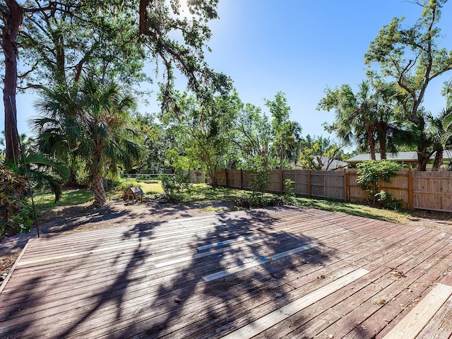2724 Ashton Rd, Sarasota, FL 34231 - wooden terrace featuring a fenced backyard