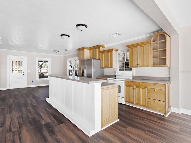 2724 Ashton Rd, Sarasota, FL 34231 - kitchen with electric range, stainless steel fridge, an island with sink, ornamental molding, and dark wood finished floors