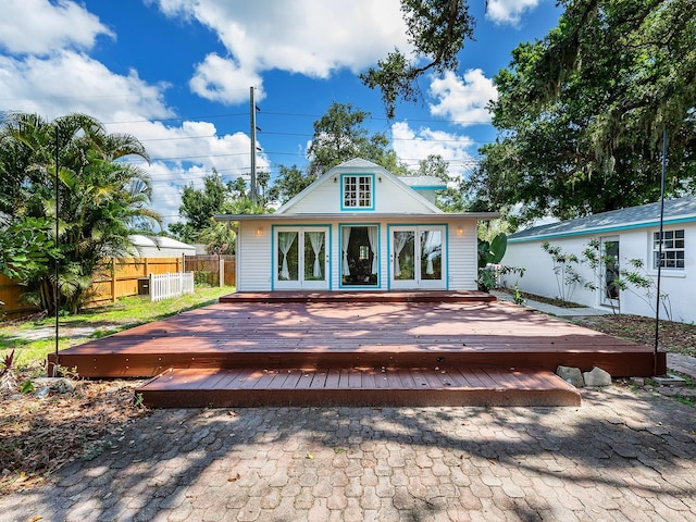 2724 Ashton Rd, Sarasota, FL 34231 - rear view of house with french doors and a deck