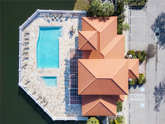 bird's eye view with a water view