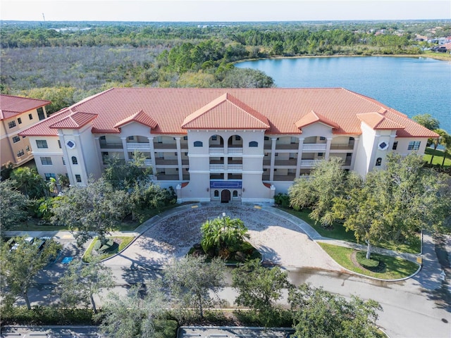 birds eye view of property featuring a water view