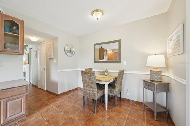 view of tiled dining space