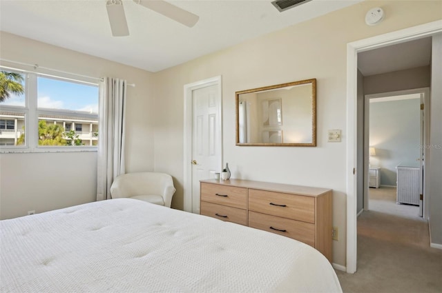 carpeted bedroom featuring ceiling fan