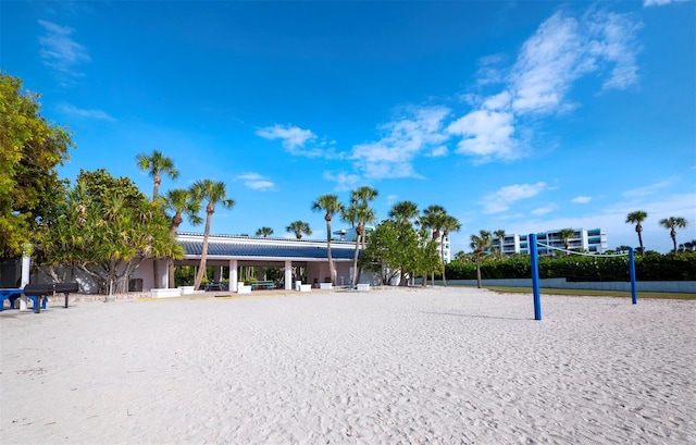 view of home's community featuring volleyball court