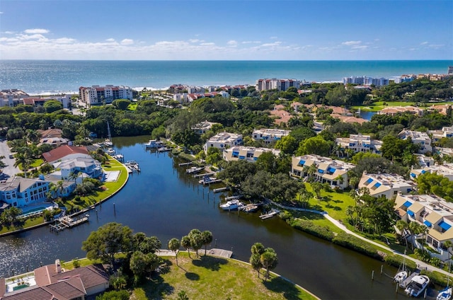 bird's eye view with a water view