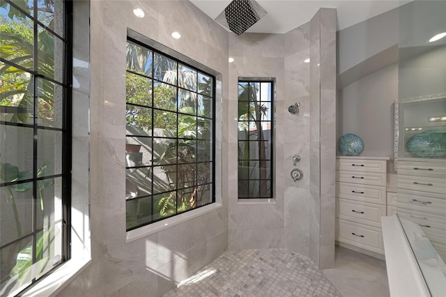 bathroom with tiled shower