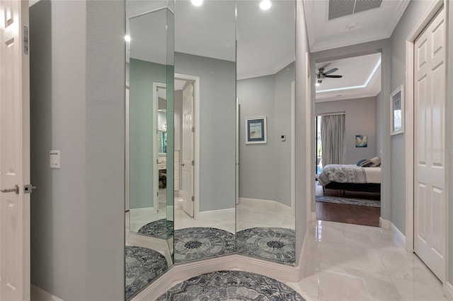 bathroom with ceiling fan and ornamental molding