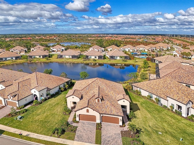 bird's eye view with a water view