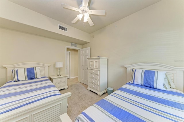 carpeted bedroom with ceiling fan and lofted ceiling