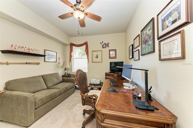 office with ceiling fan and light carpet