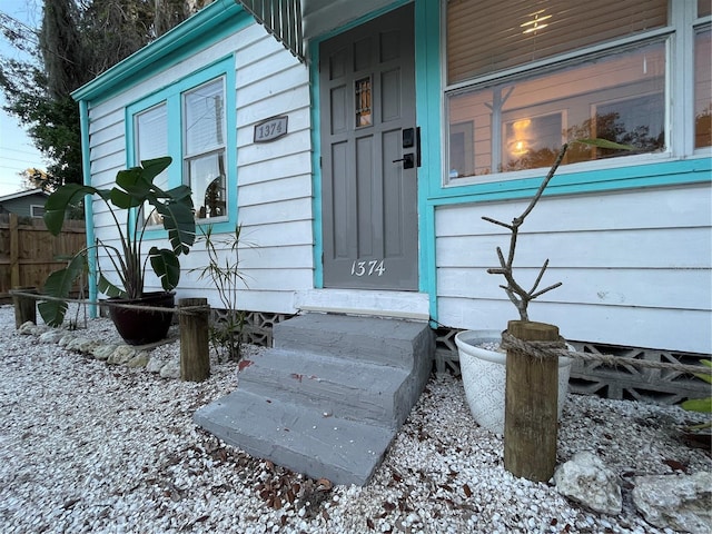 view of snow covered property entrance