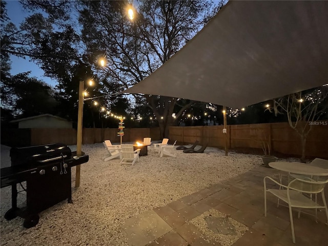 view of yard with a patio area and a fire pit