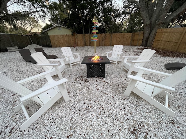 view of patio with a fire pit