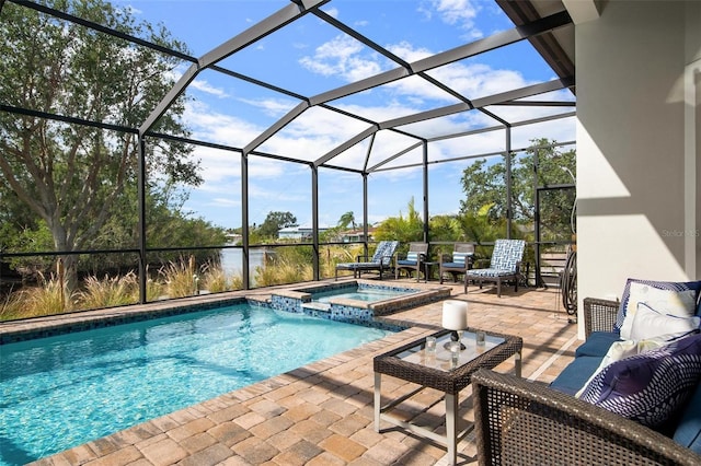 view of pool featuring glass enclosure, a patio area, an outdoor living space, a water view, and an in ground hot tub