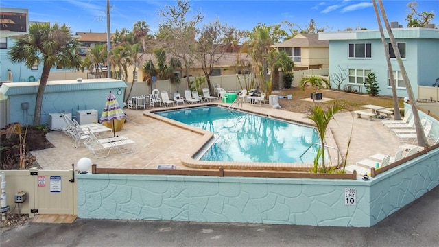 view of pool featuring a patio