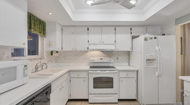 kitchen with white cabinets, white appliances, and sink