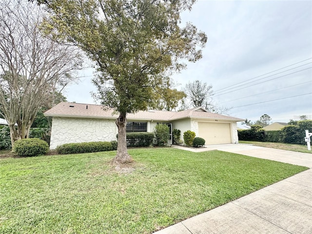 ranch-style home featuring an attached garage, stone siding, concrete driveway, and a front yard