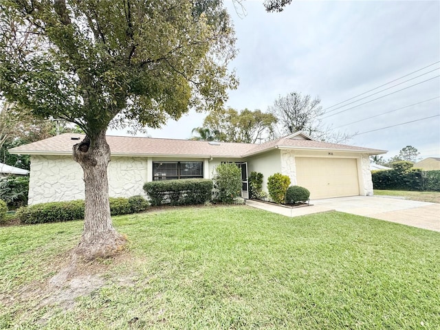 single story home featuring an attached garage, driveway, a front lawn, and stucco siding