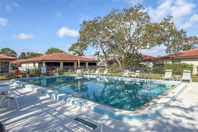 view of pool with a patio area